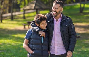 Dad with boy both laughing