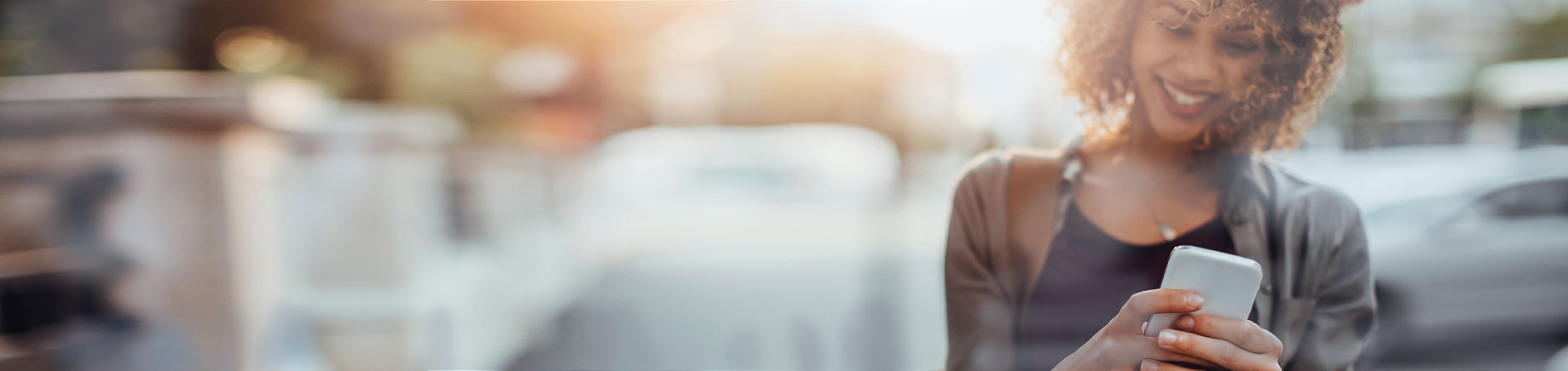 woman making call on iphone