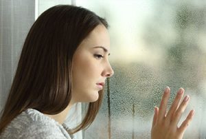 individual-woman-at-window