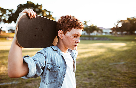 teen guy with skateboard