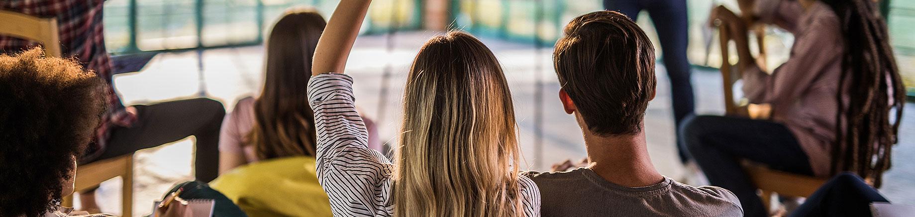 men and women in workshop